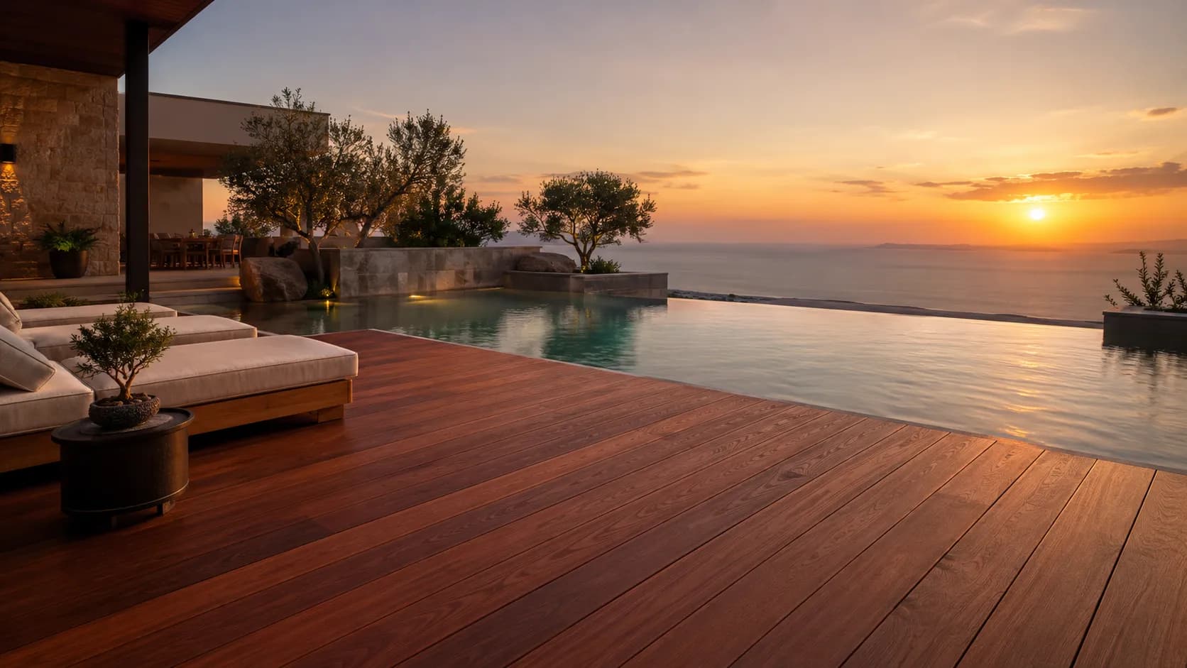 Warm hardwood decking overlooking the sea at golden hour