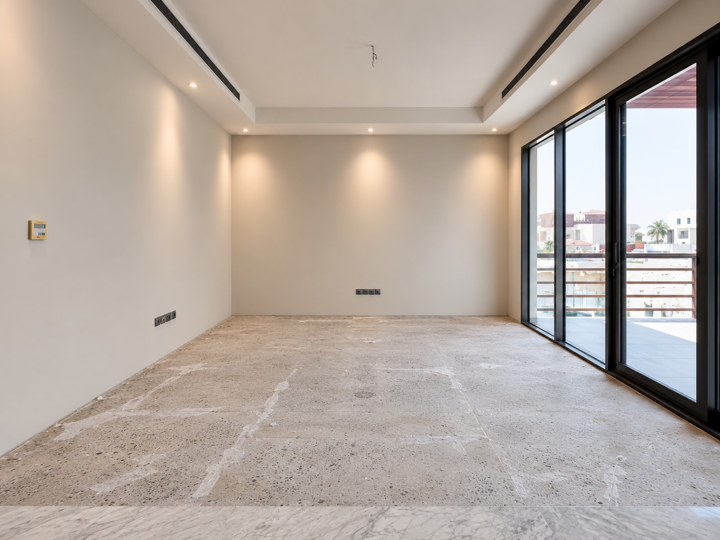 Before — the private room before its herringbone floor was introduced