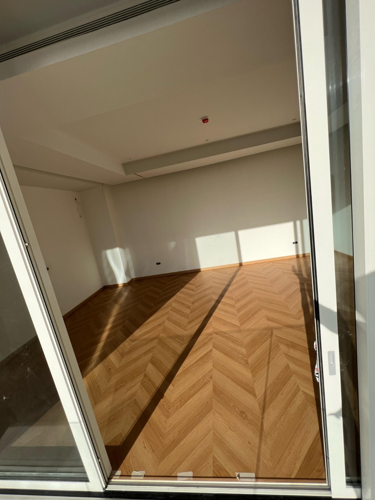 The second room completed in the same herringbone rhythm