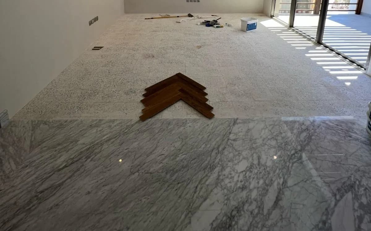 Before — the bare screed, with a single chevron sample laid on it