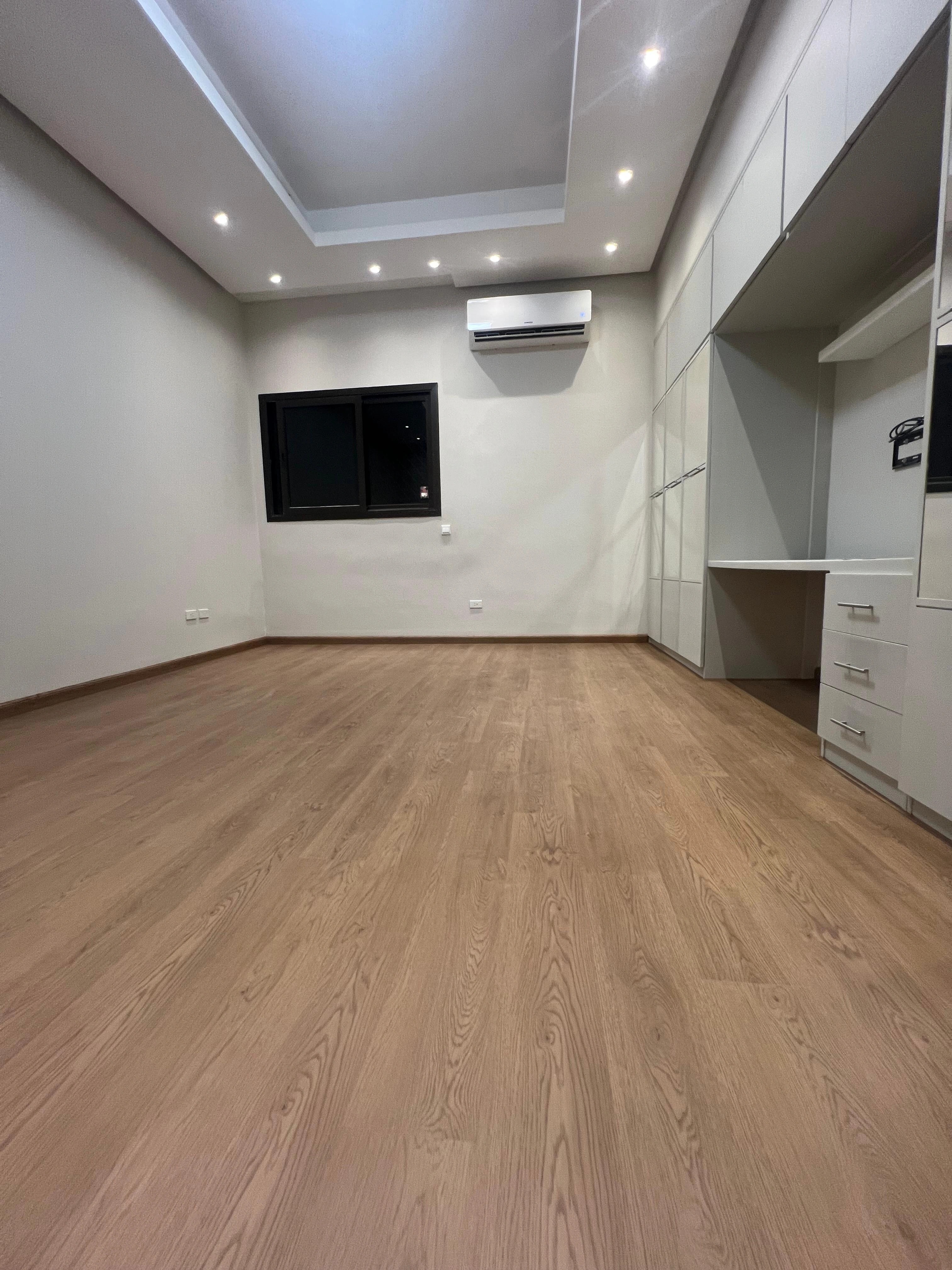 The private room completed wall to wall in warm oak