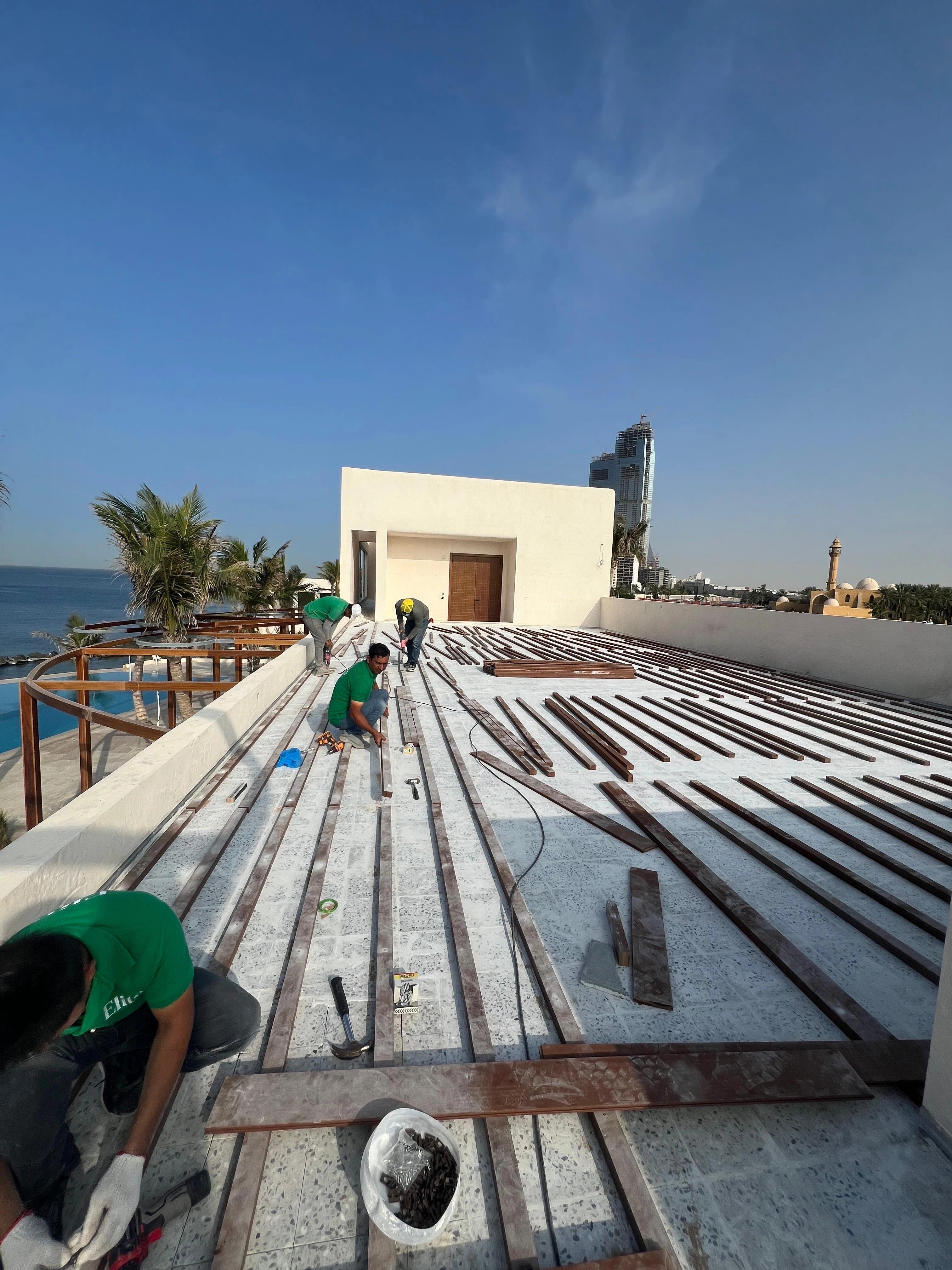 Setting out the timber terrace around drainage and service points